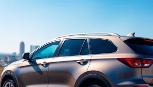 Showcasing the best window tint Chattanooga TN on a luxury vehicle with a beautiful city backdrop.